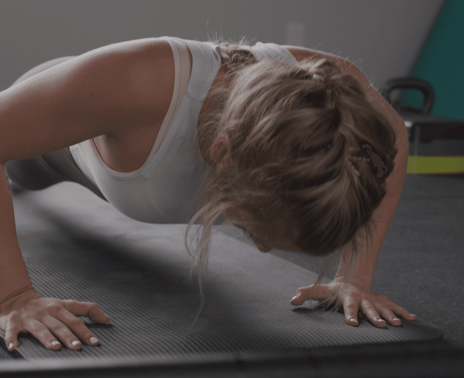 Person doing a push-up during a home strength workout